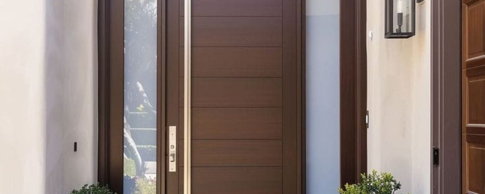 Solid wooden entrance door designed to withstand Hyderabad’s heat and seasonal humidity